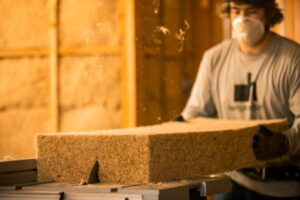 Green builders easily cut Hempitecture’s natural hemp fiber batt insulation