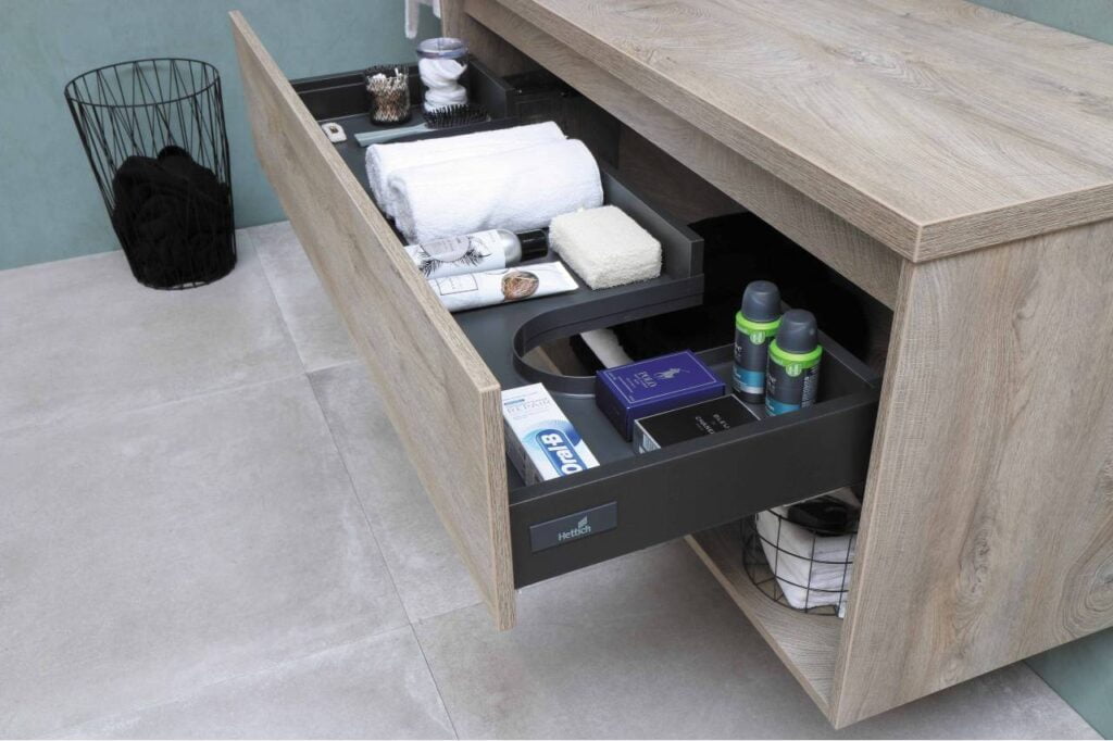 Bathroom sink cabinet with organized pullout drawer, Sanibel BV, Unsplash